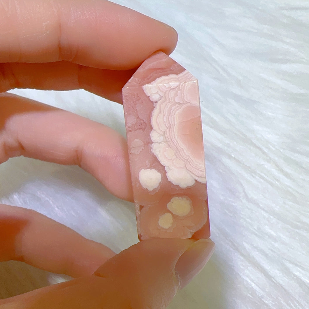 40 mm high quality rhodochrosite point